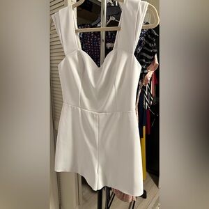 New with tags Alice and Olivia size 4 new with tags  romper